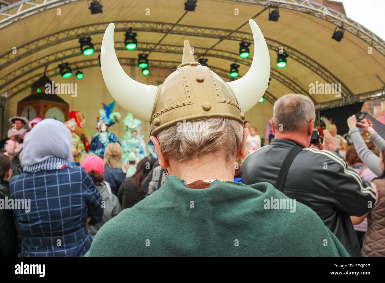 man in a viking costume and a helmet with horns at the carnival Stock Photo