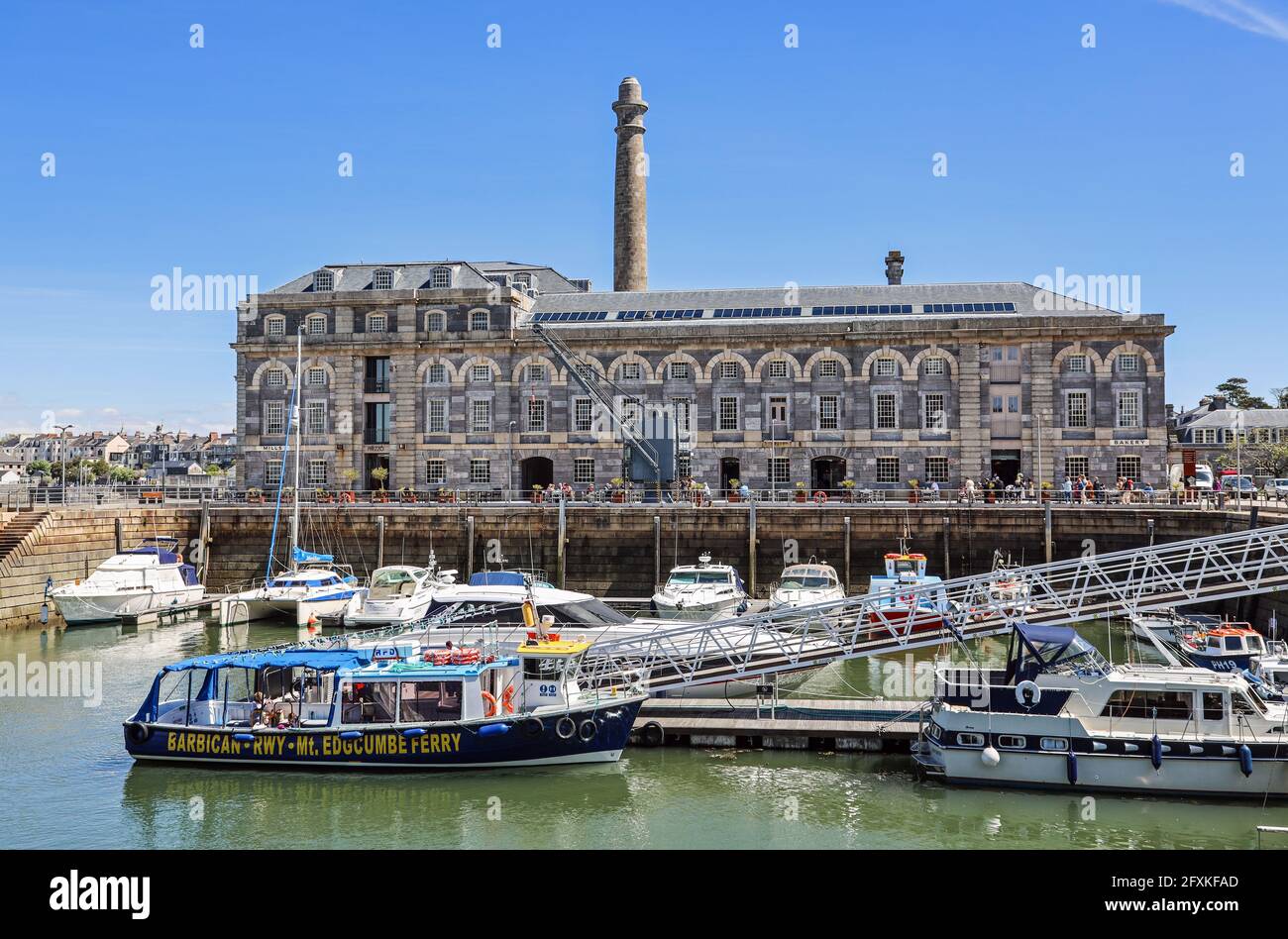 The Plymouth waterfront ferry berthed in the pool at the Royal William Yard, in from Mount Edgcumbe Park on its way to the Barbican. Stock Photo