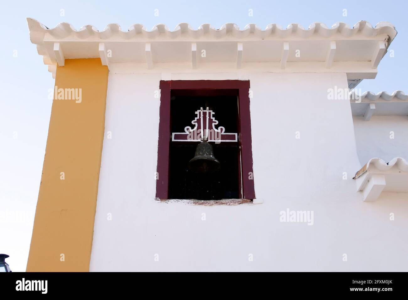 Tiradentes, Minas Gerais, Brazil - May 26, 2019: church tower and bell detail and characteristic architecture in the city historic Tiradentes, interio Stock Photo