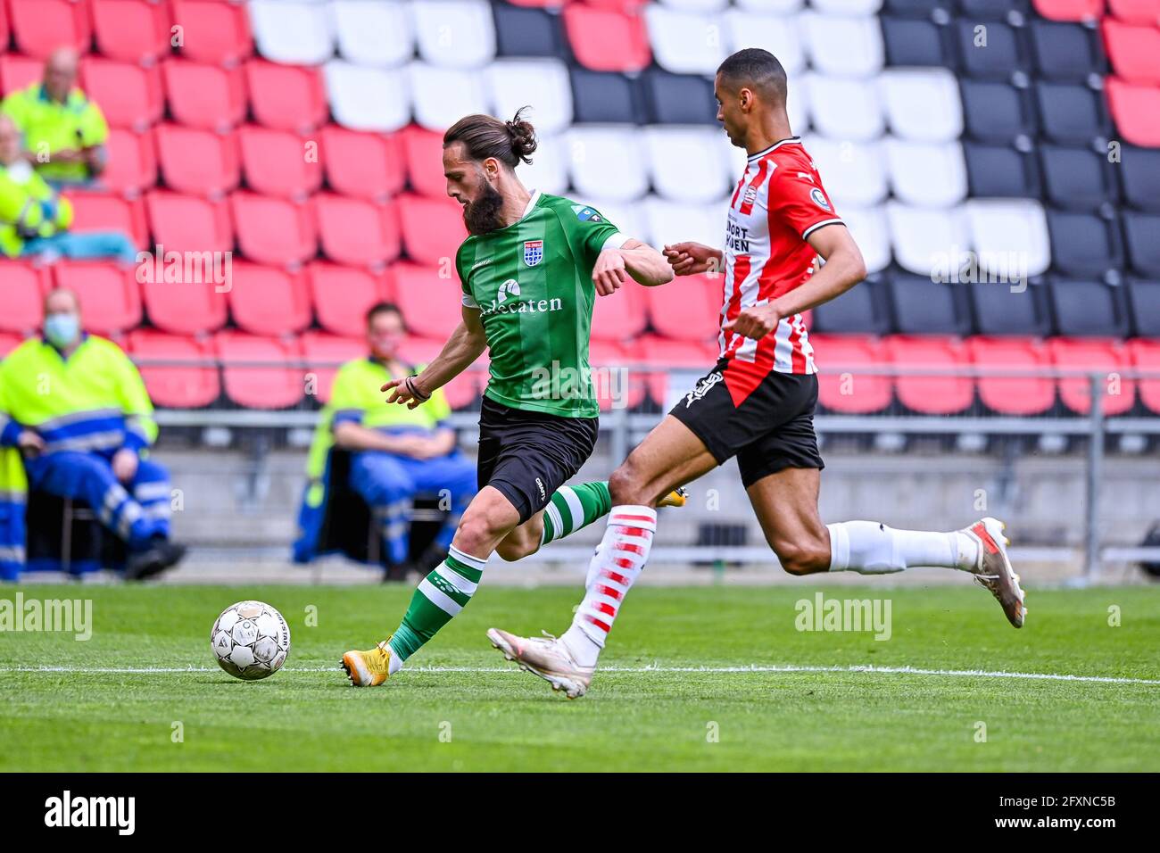 EINDHOVEN, NETHERLANDS - MAY 13: Destan Bajselmani of PEC Zwolle Cody Gakpo of PSV Eindhoven during the Dutch Eredivisie match between PSV and PEC Zwo Stock Photo