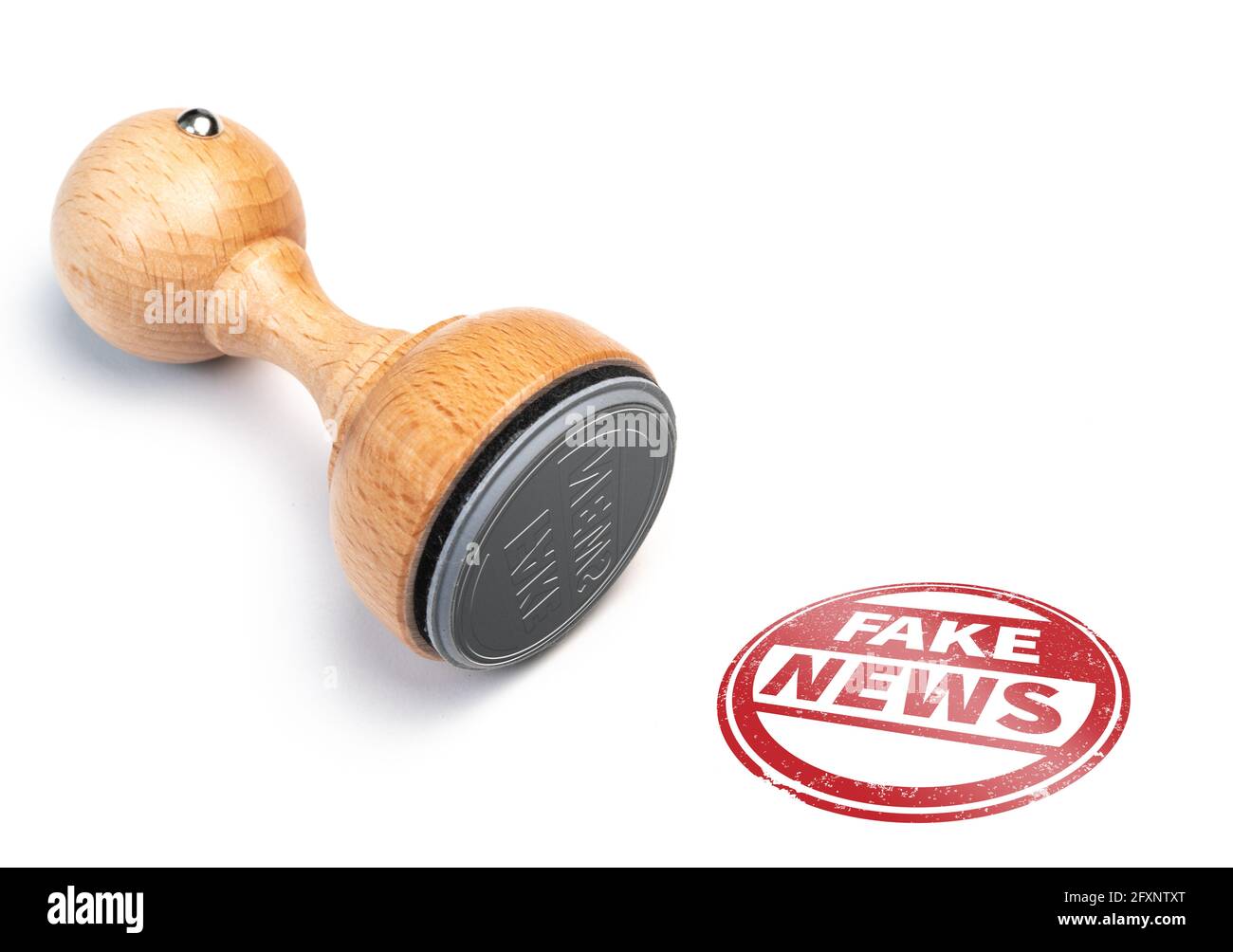 round FAKE NEWS rubber stamp and red imprint on white background Stock Photo