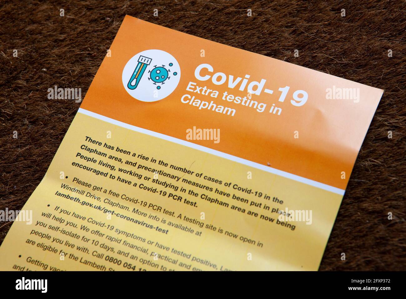 London, UK, 27 May 2021: Due to cases of the India variant of coronavirus in a local school, homes in the area have been sent leaflets by Lambeth Council asking residents to take a PCR test. A temporary centre for collecting kits has been set up on Clapham Common's Windmill Drive. Anna Watson/Alamy Live News Stock Photo