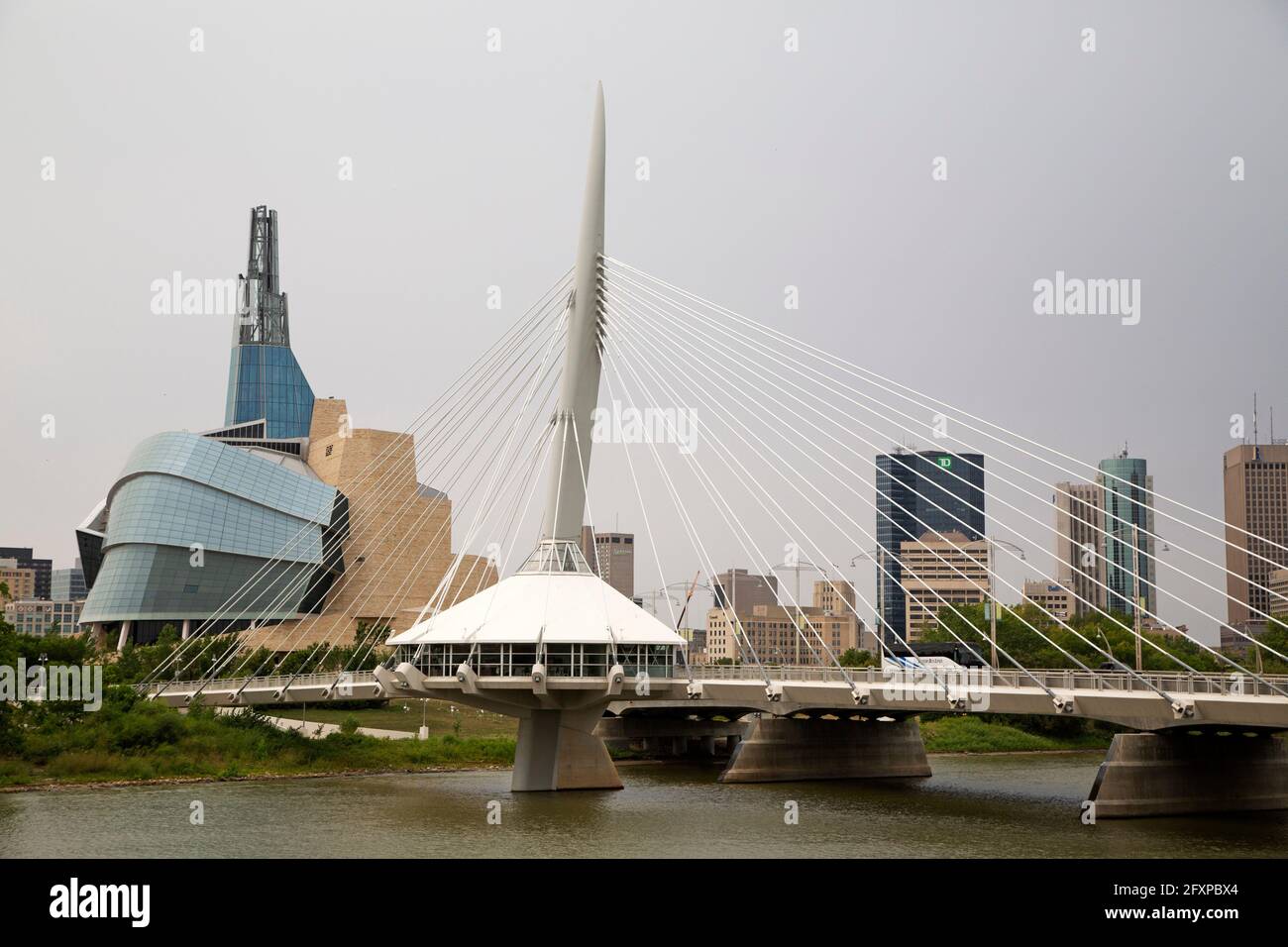 The Provecher Bridge crosses the Red River in Winnipeg, Canada. The bridge stands close to the Canadian Museum for Human Rights. Stock Photo