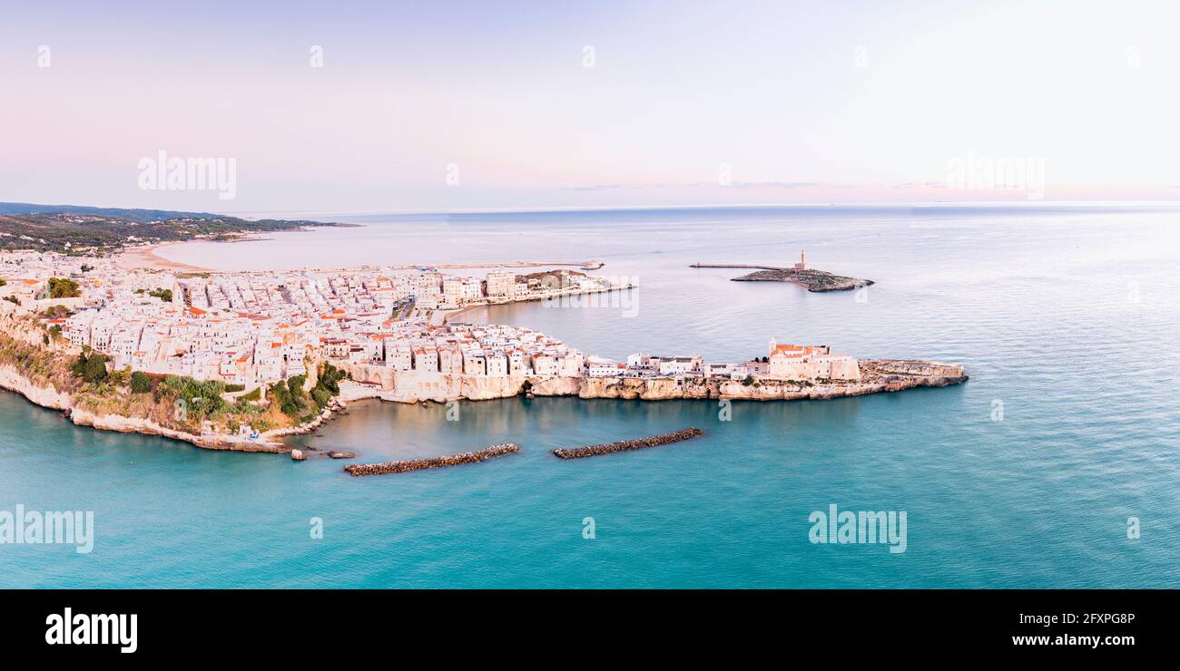 Aerial view of the white buildings of Vieste at sunrise, Foggia province, Gargano National Park, Apulia, Italy, Europe Stock Photo