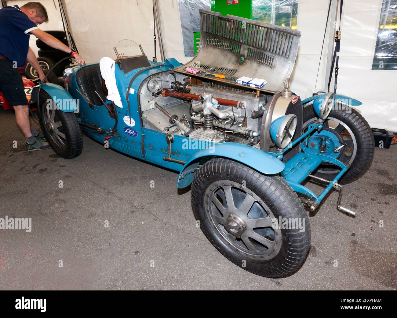 A Blue, 1927, Bugatti 35C being worked on, at  the 2017 Silverstone Classic Stock Photo