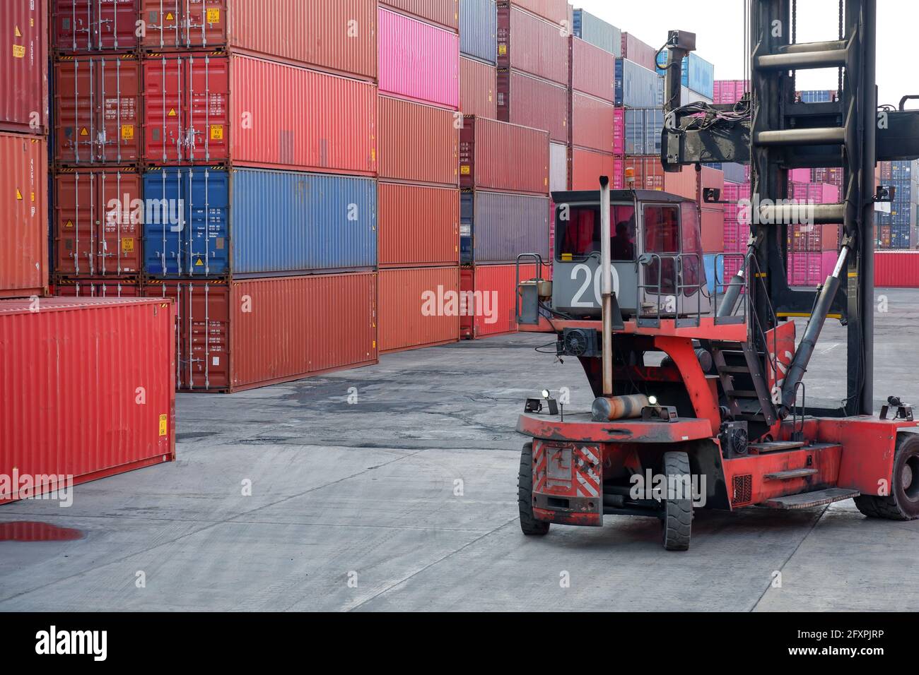 Picture of container handlers and container piles Stock Photo - Alamy