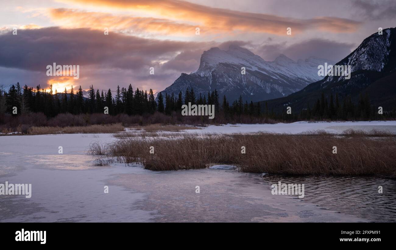 Mount Rundle sunrise with lake ice, Vermillion Lakes, Banff National Park, UNESCO World Heritage Site, Canadian Rockies, Alberta, Canada Stock Photo
