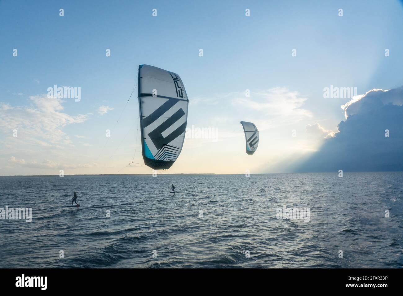 Foiling kiteboarders on the Pamlico Sound, Nags Head, North Carolina, United States of America, North America Stock Photo