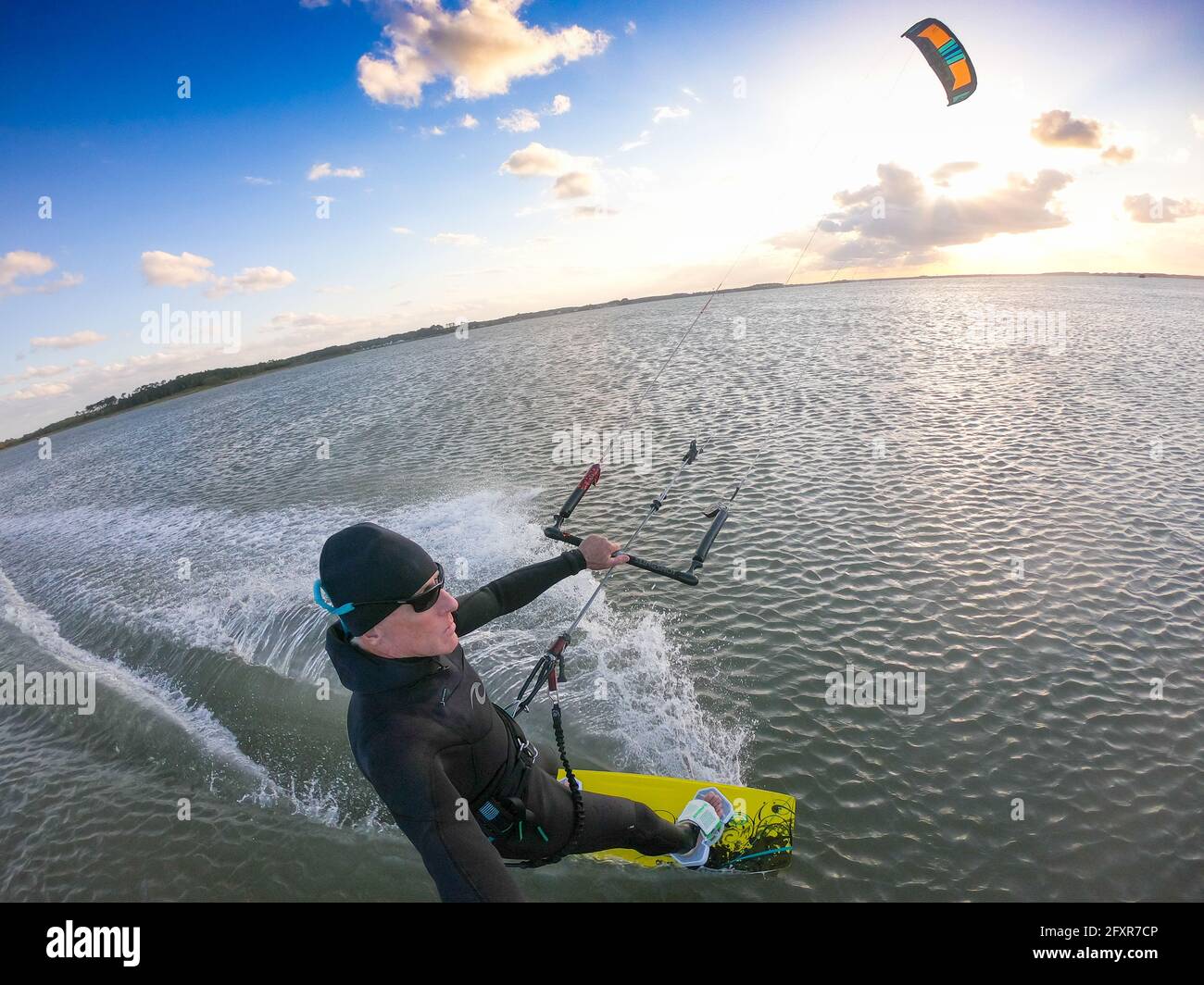Photographer Skip Brown kiteboards on flat water on Chesapeake Bay at Hampton, Virginia, United States of America, North America Stock Photo