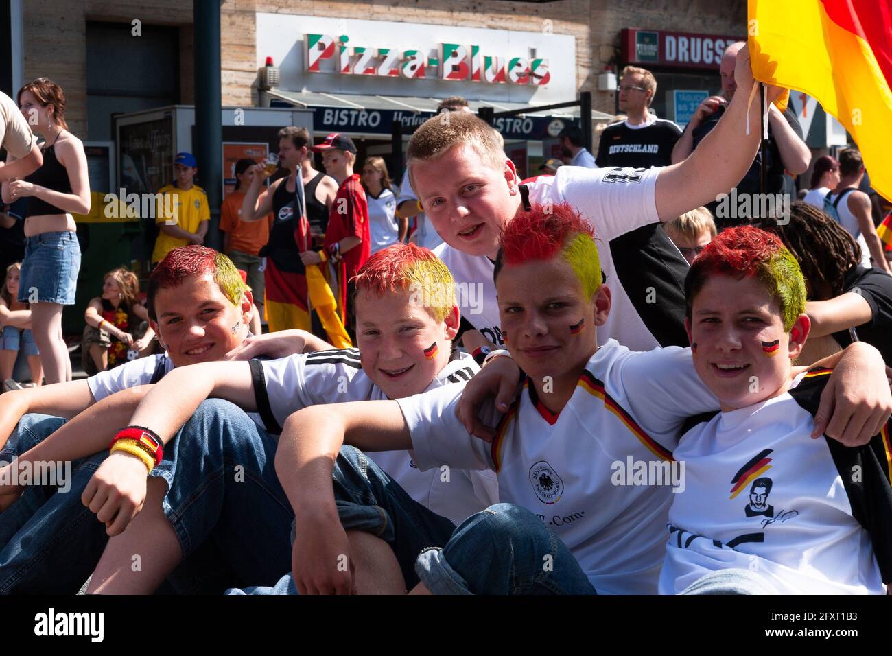 Public viewing: A group of young people celebrate the 2006 World Cup Stock Photo