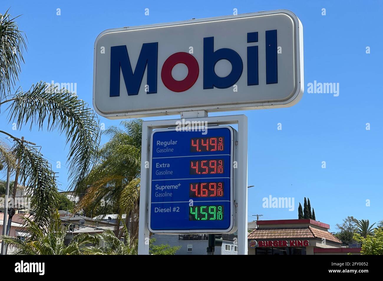 Gasoline prices are seen at a Mobil station, Sunday, May 23, 2021, in