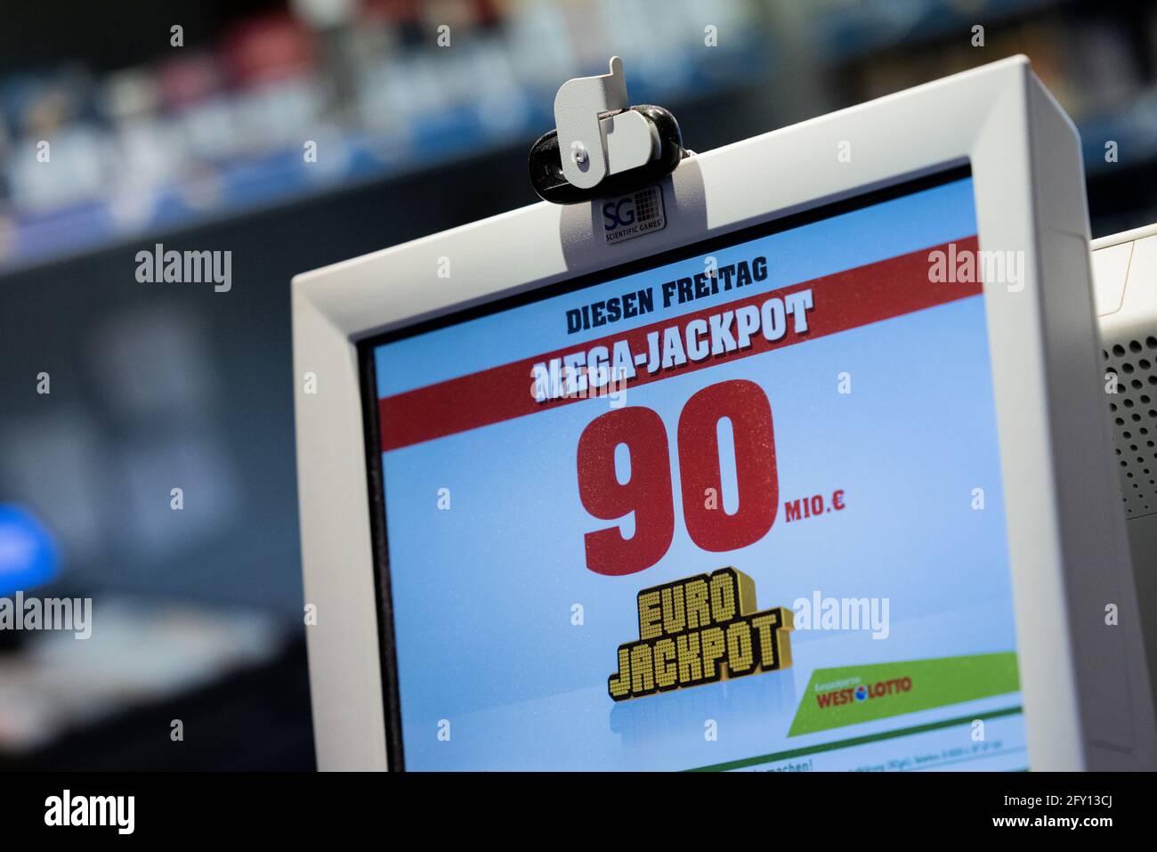 Cologne, Germany. 27th May, 2021. The Euro Jackpot of ·90 million can be  seen on a monitor. The Mega Jackpot has built up over six draws. Therefore,  the maximum is to be