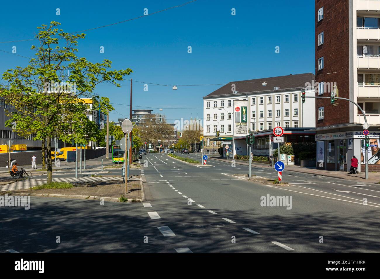 Germany, Oberhausen, Alt-Oberhausen, Ruhr area, Lower Rhine, Rhineland, North Rhine-Westphalia, NRW, view along the Friedrich Karl Strasse towards German Post and Central Station and also to the Labour Court Oberhausen, main road Stock Photo