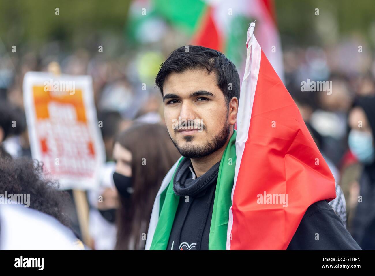 Portrait of male protester with Palestinian flag, Free Palestine Protest, Hyde Park, London, 22 May 2021 Stock Photo