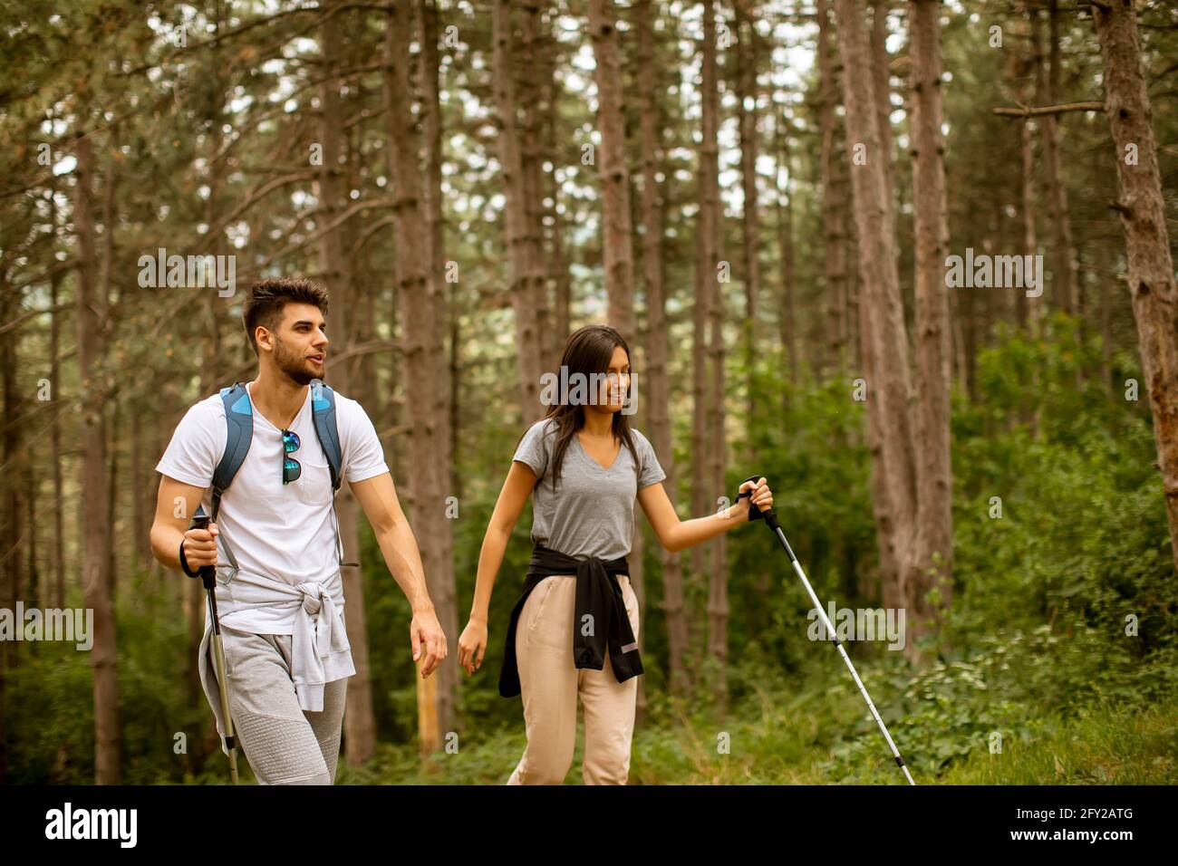 Man woman female couple walking hiking hi-res stock photography and ...