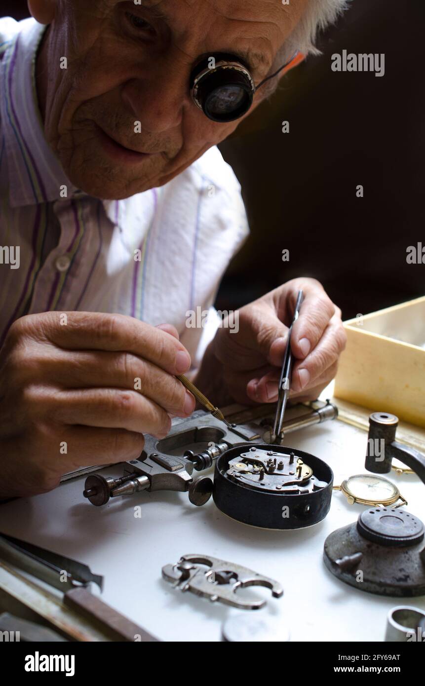 old watchmaker at work Stock Photo Alamy