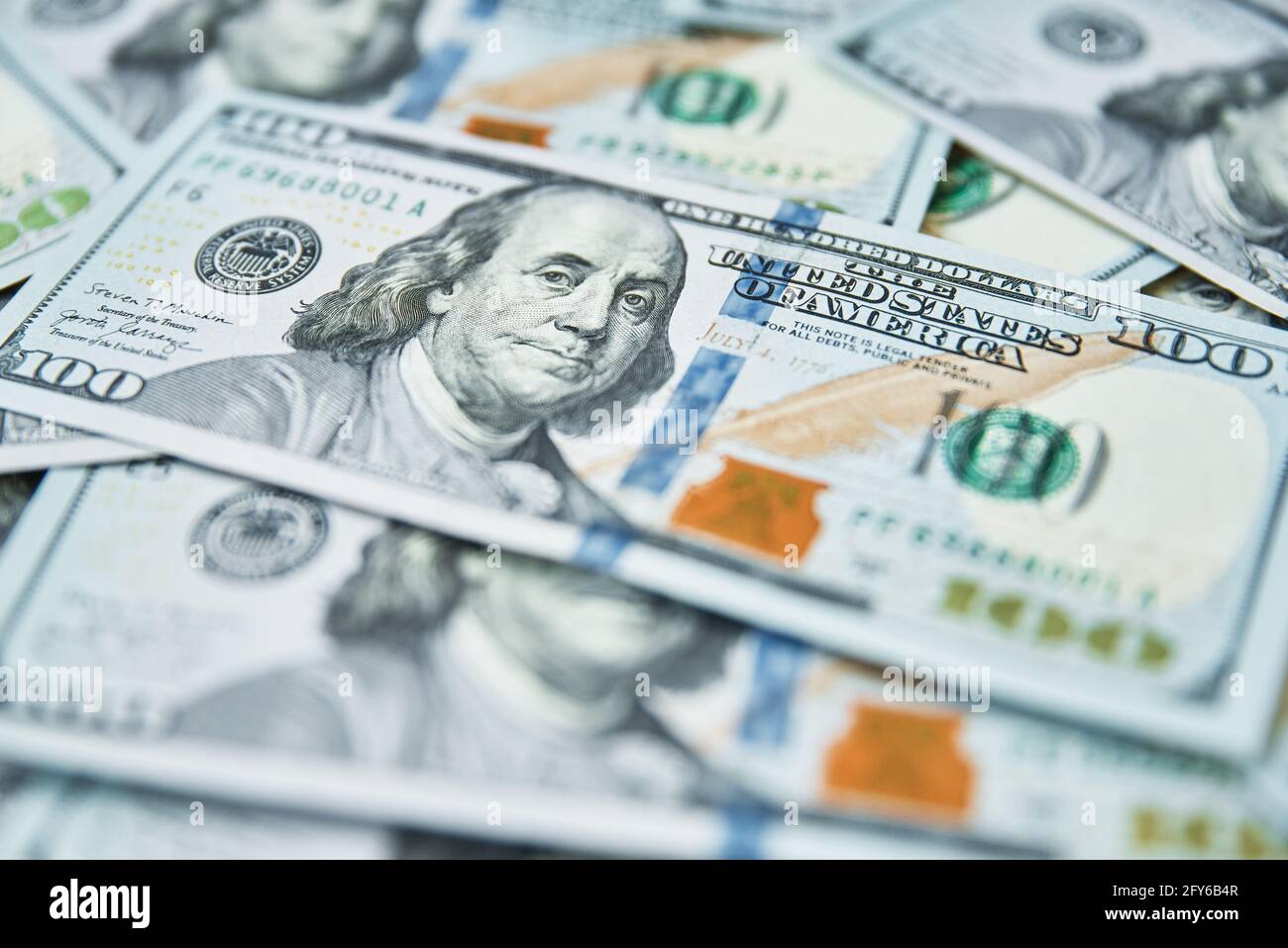 Dollar bills background. Pile of american money cash. One hundred usd dollars banknotes. Financial crisis Stock Photo