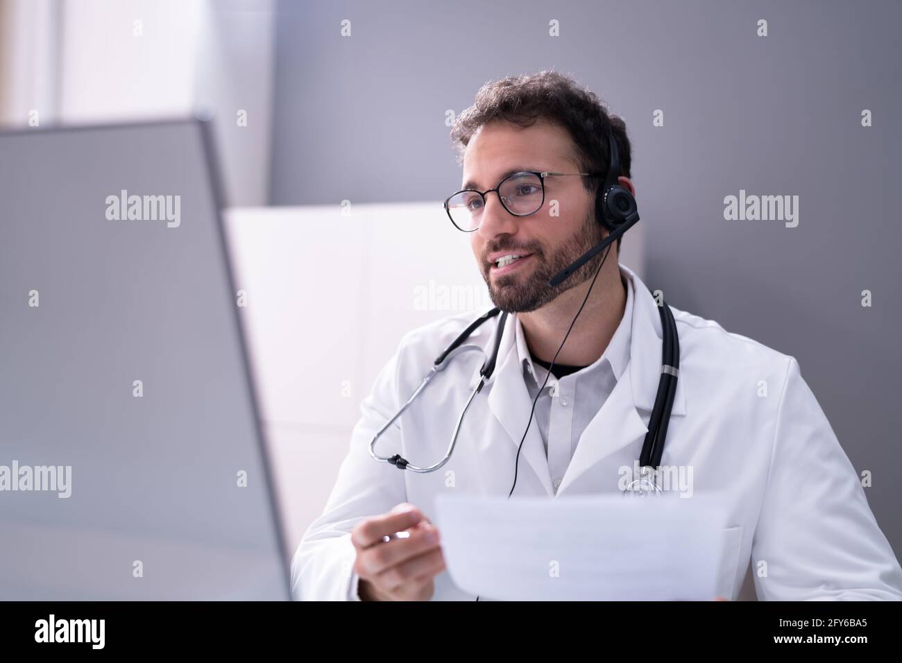 Doctor Online Consult Video Call On Computer Stock Photo