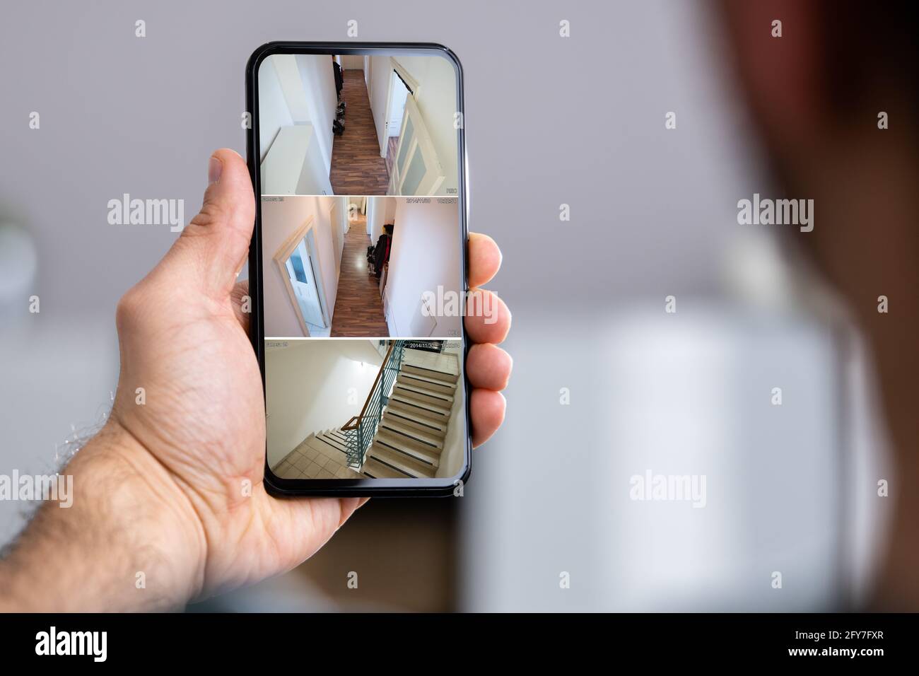 Security System CCTV Video Spy Cameras On Phone Stock Photo