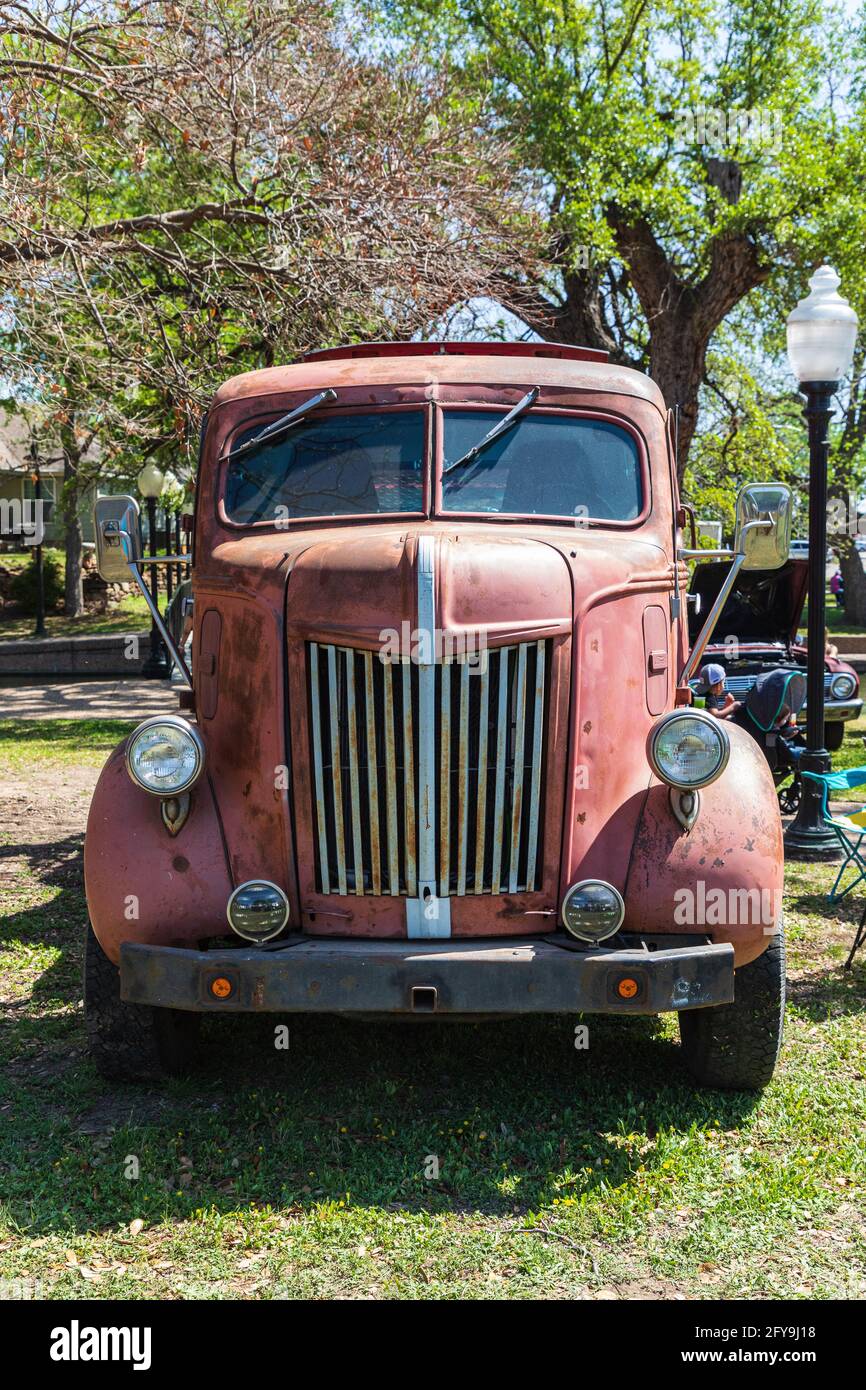 Marble Falls, Texas, USA. April 10, 2021. Rusted vintage truck at a car