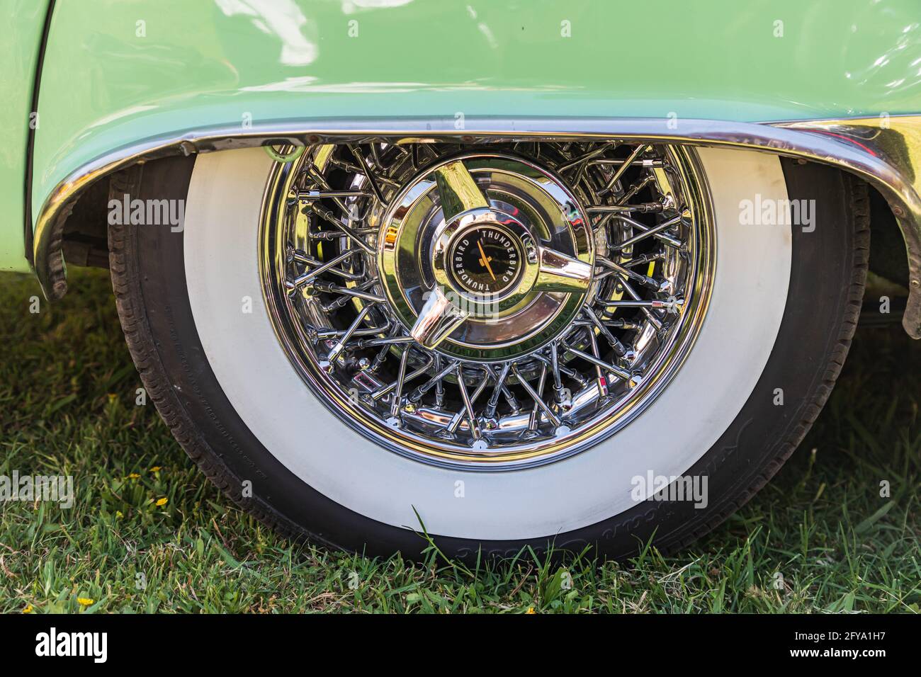 Marble Falls, Texas, USA. April 10, 2021. Spoked wheel with whitewall tire on a vintage Ford Thunderbird. Stock Photo