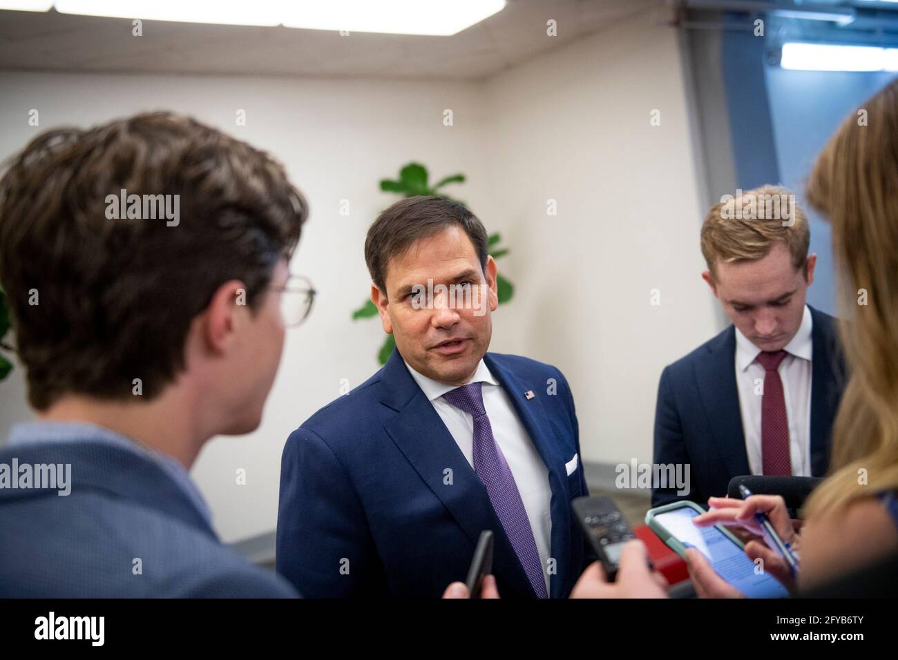 Washington, United States Of America. 27th May, 2021. United States Senator Marco Rubio (Republican of Florida) talks to reporters as he waits for a train in the Senate subway, during a vote at the US Capitol in Washington, DC, Thursday, May 27, 2021. Credit: Rod Lamkey/CNP/Sipa USA Credit: Sipa USA/Alamy Live News Stock Photo