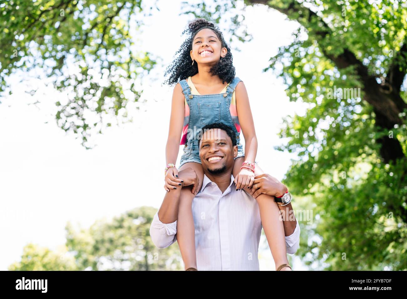 Father and daughter having fun together outdoors Stock Photo - Alamy