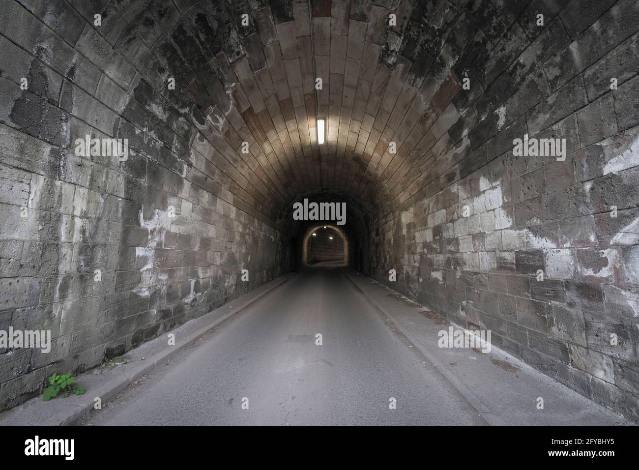 road in a historic tunnel Stock Photo