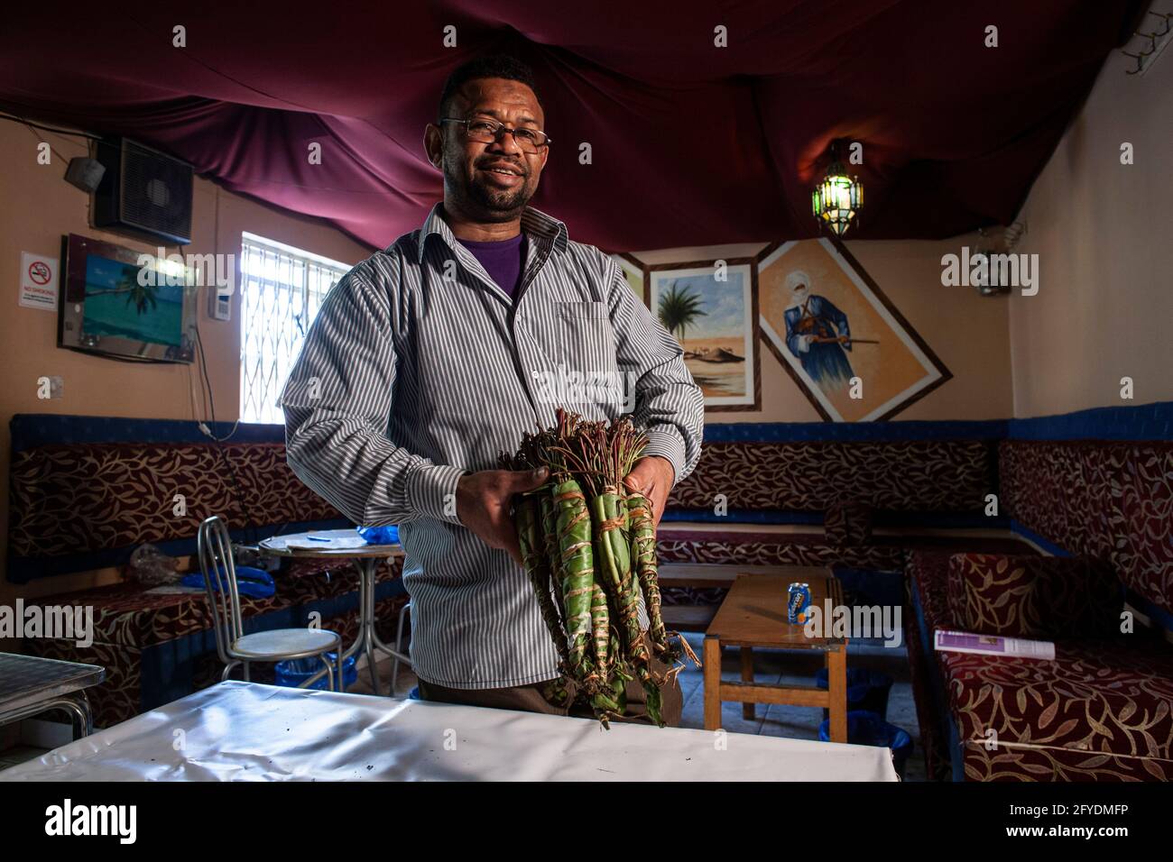 Camden ,London, UK. The drug Khat on the table in local Somali cafe. The drug mainly used by Somalians becomes illegal in the UK. Stock Photo