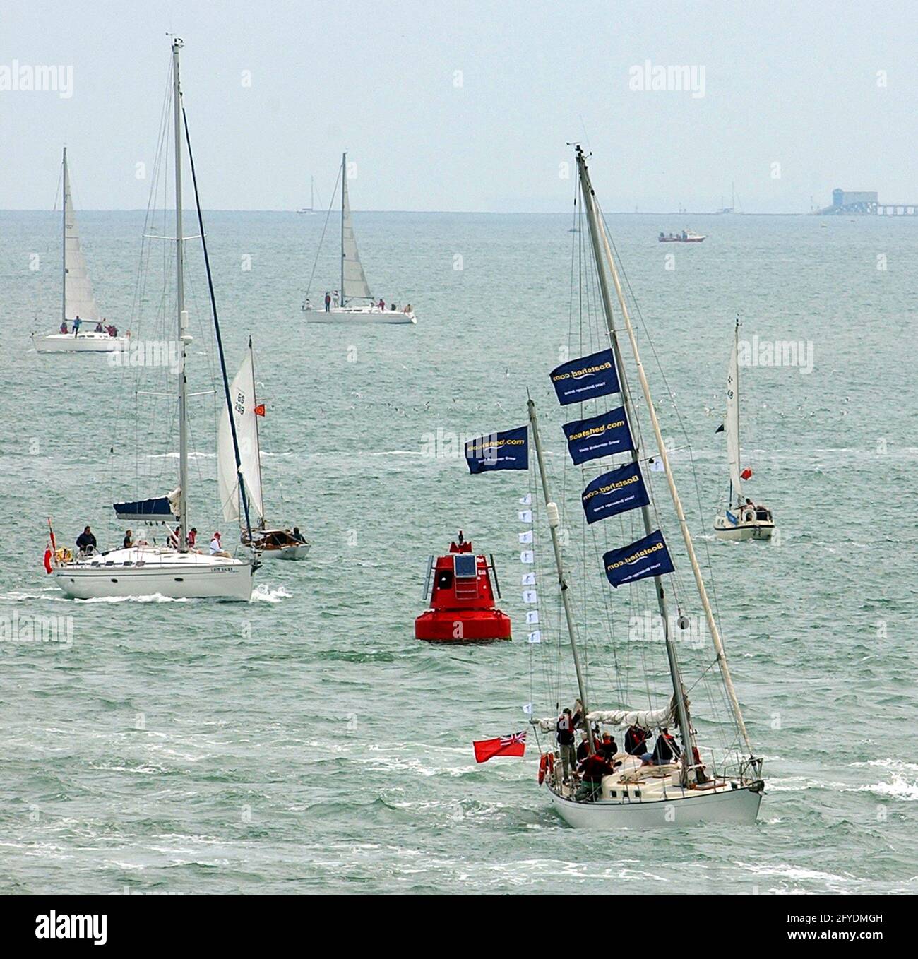 THE FOUR BOATS THAT MADE THE LIVE 8 SAIL FROM FRANCE ENTER PORTSMOUTH HARBOUR BUT BOB GELDOF WAS TOO TIRED TO WELCOME THEM. PIC MIKE WALKER, 2005 Stock Photo