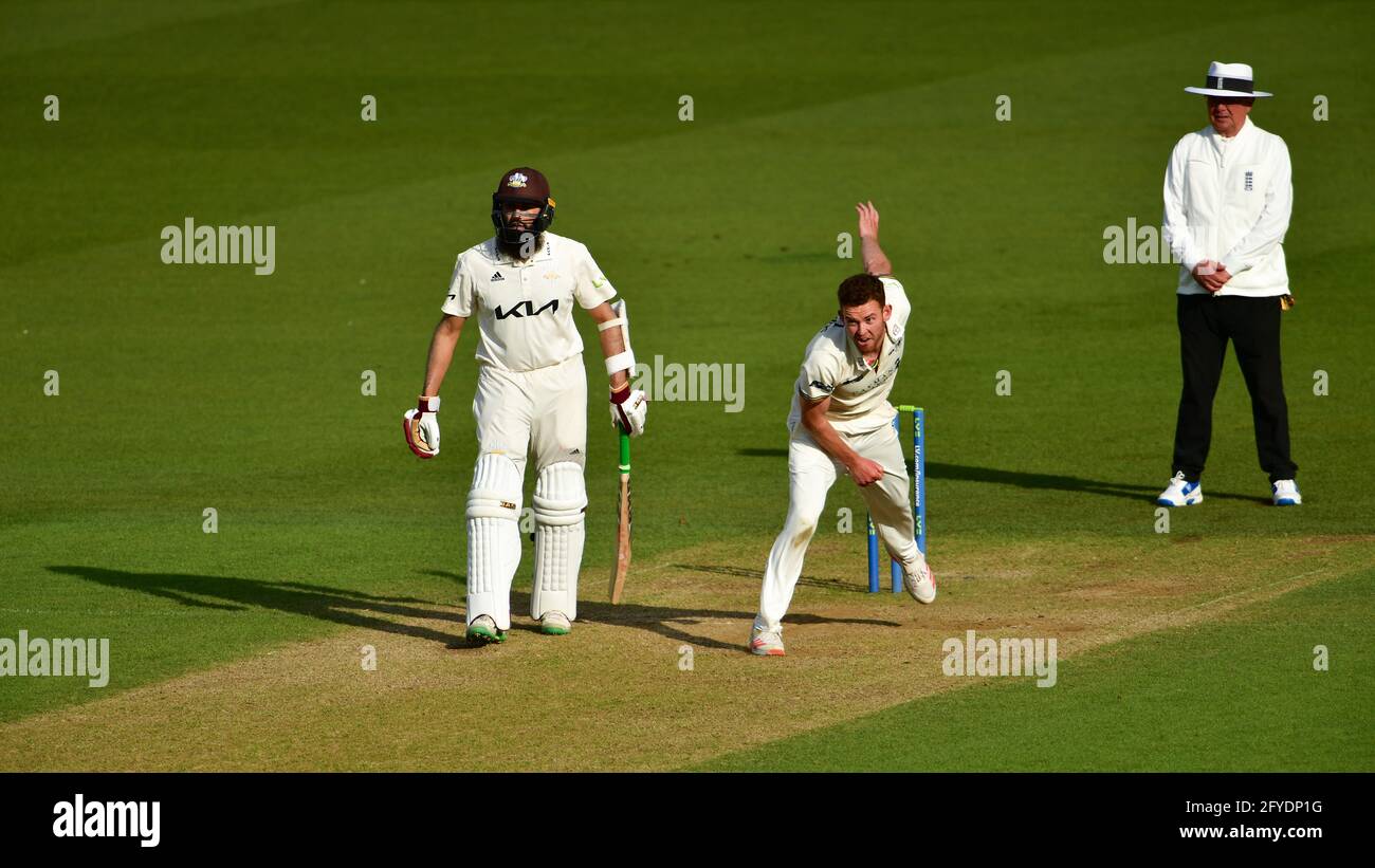 The Kia Oval, London, UK. 27th May, 2021. Ryan Higgins of Gloucestershire bowls on Day 1 of the LV=Insurance County Championship match between Surrey and Gloucestershire: Credit: Ashley Western/Alamy Live News Stock Photo