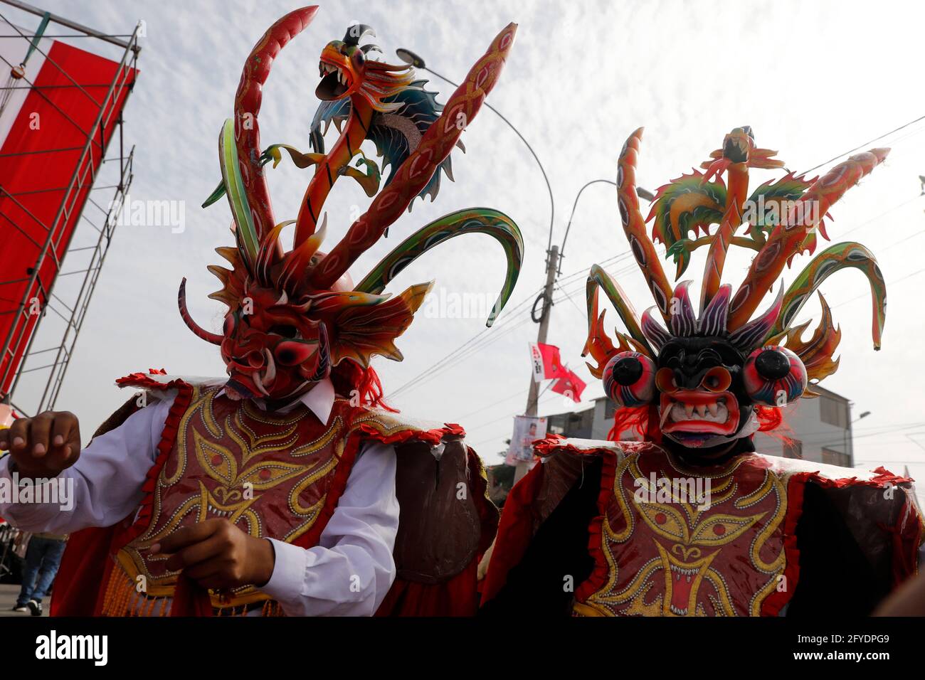 Lima, Peru. 26th May, 2021. Dancers with traditional dress attend a campaign rally for Presidential candidate Pedro Castillo, in Villa El Salvador neighborhood. On June 6 Peruvians will go to the polls to elect new President between Castillo and Keiko Fujimori. Credit: Mariana Bazo/ZUMA Wire/Alamy Live News Stock Photo