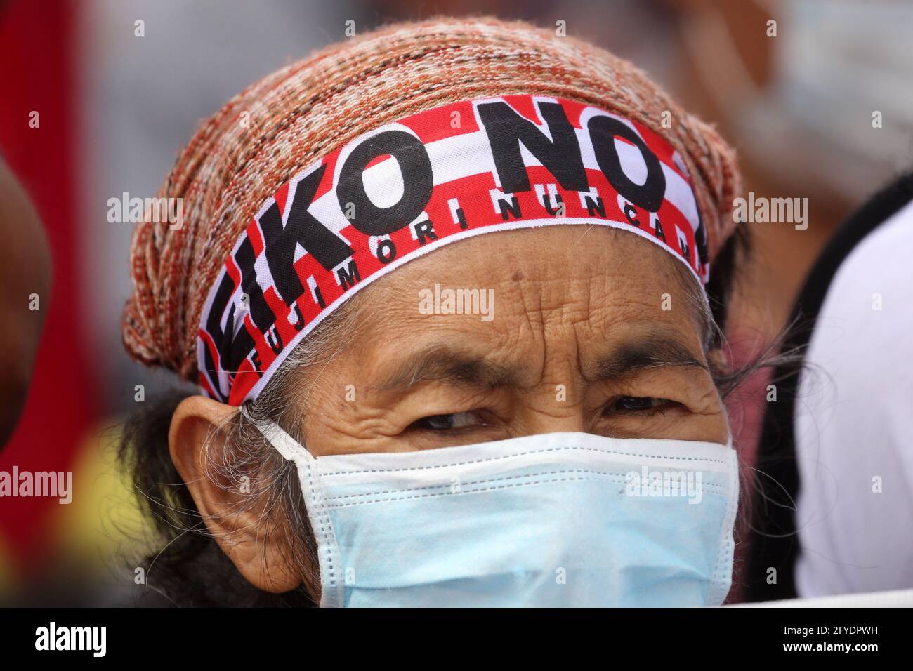 Lima, Peru. 26th May, 2021. A woman with a sign reads 'Keiko no' attends a campaign rally for Presidential candidate Pedro Castillo, in Villa El Salvador neighborhood. On June 6 Peruvians will go to the polls to elect new President between Castillo and Keiko Fujimori. Credit: Mariana Bazo/ZUMA Wire/Alamy Live News Stock Photo