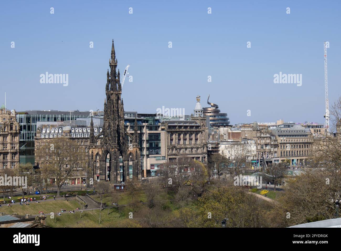 A view of the Edinburgh Skyline and Princes Street, including the Scott Monument and the new St James Centre or 'Golden Turd'. Stock Photo