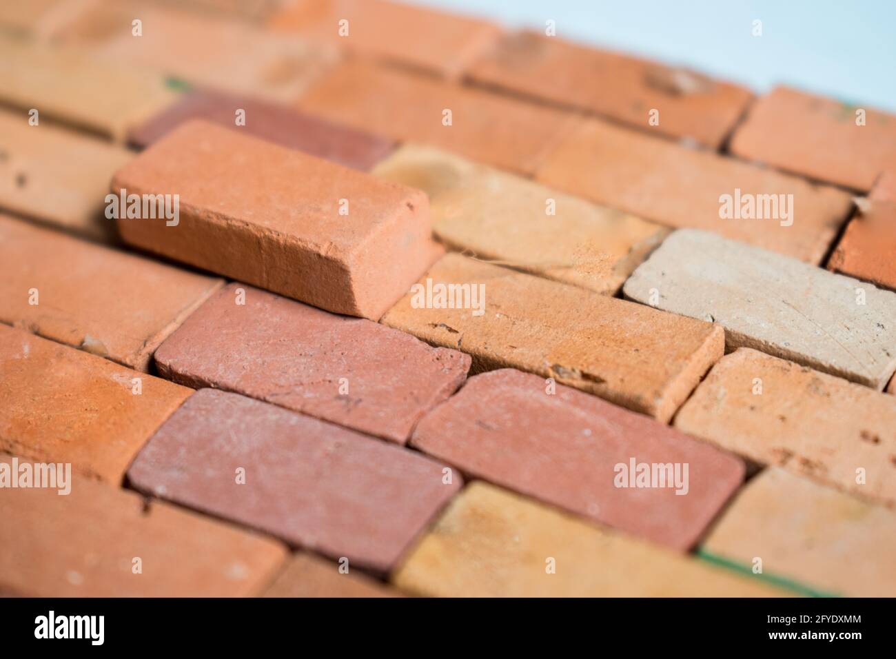 Closeup of a background with some red bricks making a wall texture Stock Photo