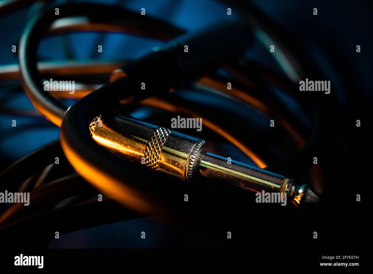 Closeup of metal quarter inch instrument cable connector laying in