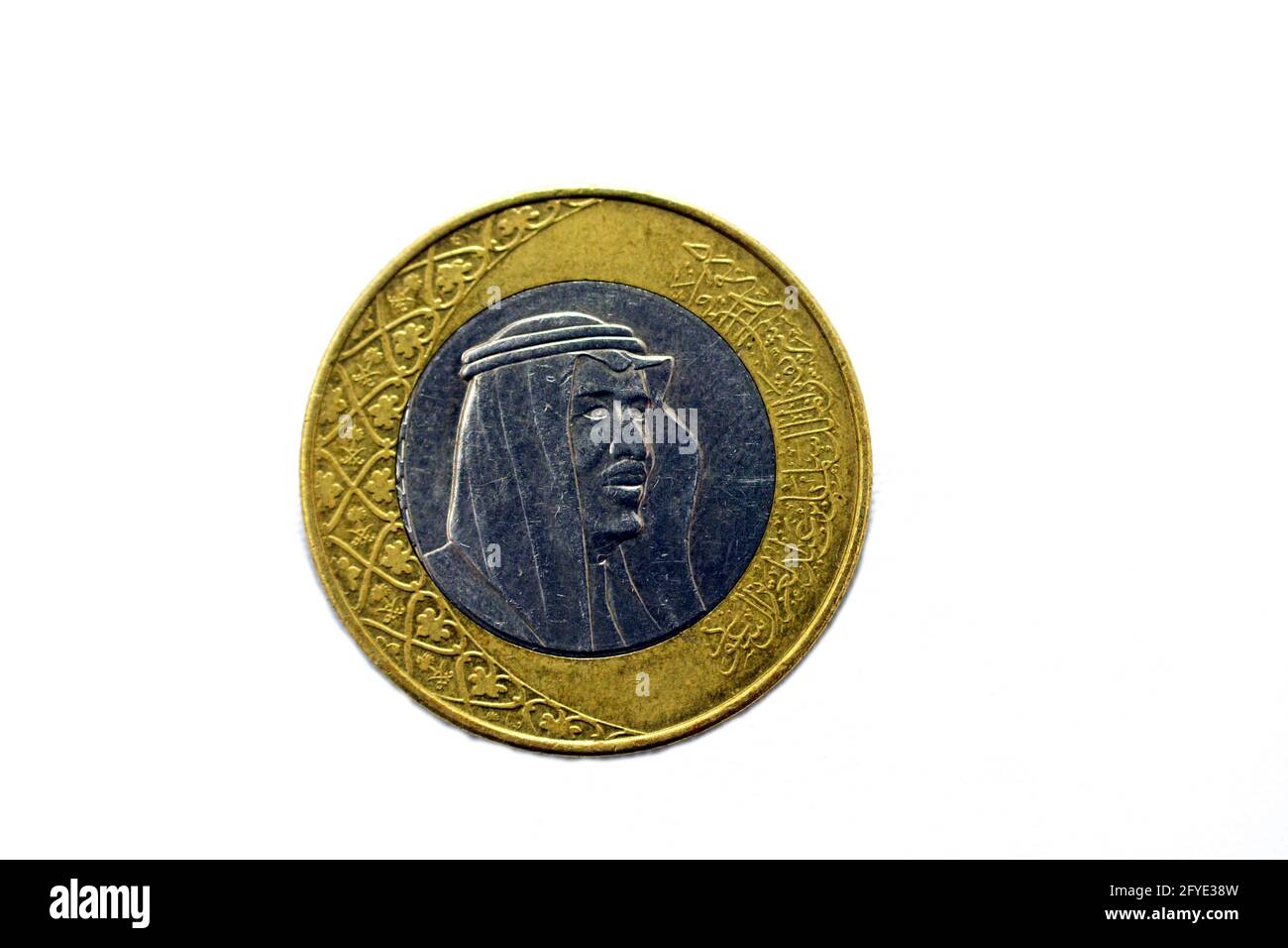 One Saudi Arabia riyal coin (obverse side) year 2016, one metal and ...