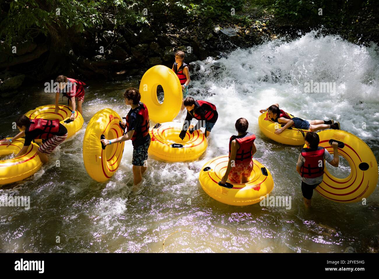 Students take a trip with the Harpers Ferry Adventure Center to go river  tubing along the Shenandoah River in Millville, West Virginia, U.S., May  27, 2021. REUTERS/Hannah Beier Stock Photo - Alamy