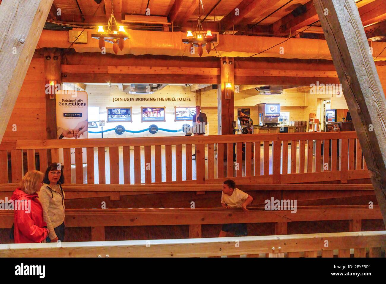 People walk through the inside of Ham's Ark Encounter that is