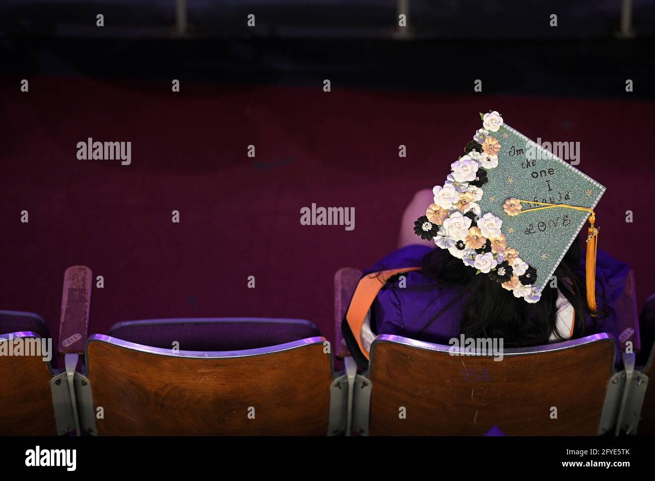 New York, USA. 27th May, 2021. A graduate nurse wearing a decorated cap