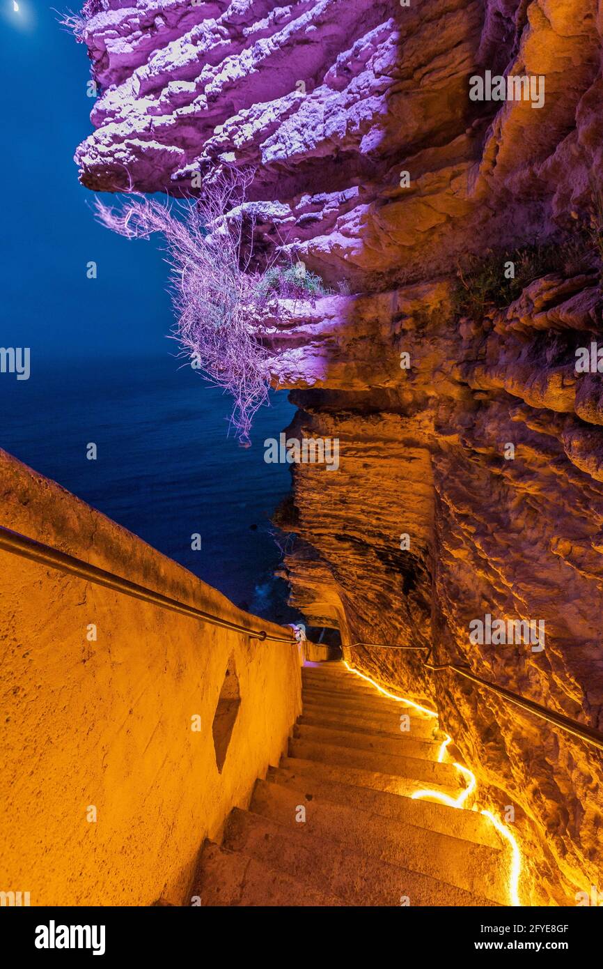 FRANCE, CORSE DU SUD (2A) AREA EXTREME SUD, BONIFACIO, FESTI LUMI ORGANISED BY THE CITY OF BONIFACIO, STAIRCASE OF THE KING OF ARAGON, CARVED BY MAN D Stock Photo
