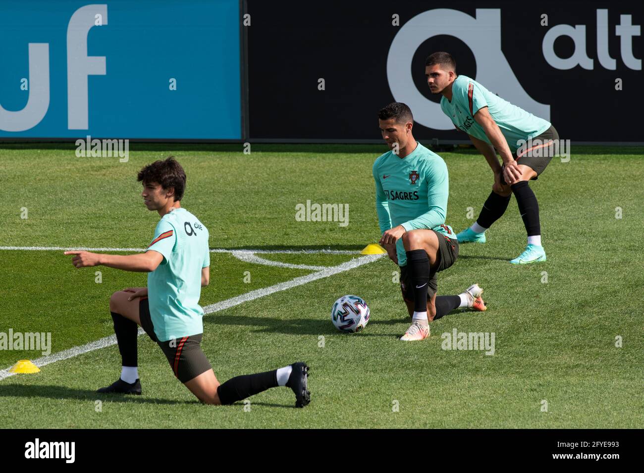 Oeiras, Portugal. 27th May, 2021. Joao Felix (L), Cristiano Ronaldo (C) and Andre Silva (R) are seen in action during the training session at Cidade do Futebol training ground in Oeiras.Portugal football team trains for the first time before competing in the European football championship - EURO 2020 - scheduled to start on June 11th. (Photo by Hugo Amaral/SOPA Images/Sipa USA) Credit: Sipa USA/Alamy Live News Stock Photo