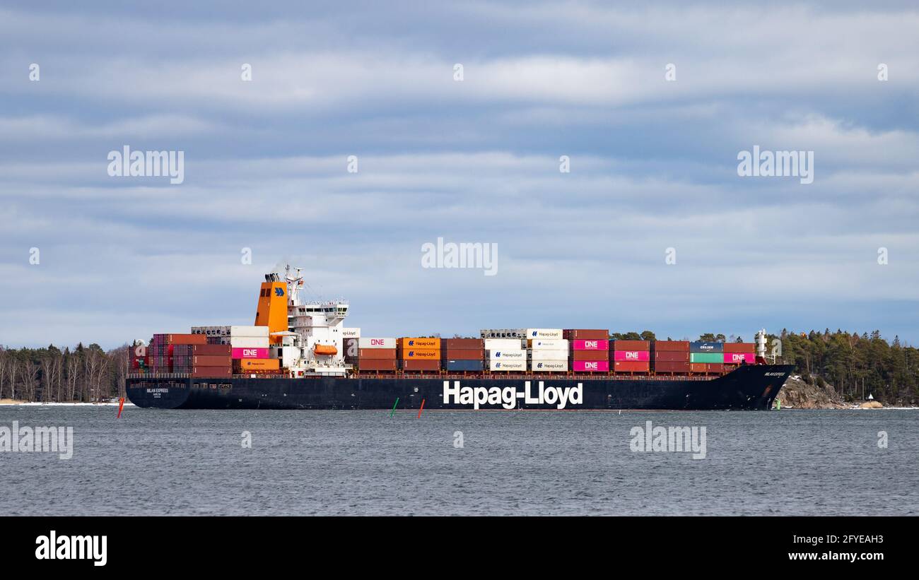 Containership Milan Express leaving Vuosaari Harbour on March 21, 2021. Operated by Hapag-Lloyd and sailing under Bermuda flag. Stock Photo