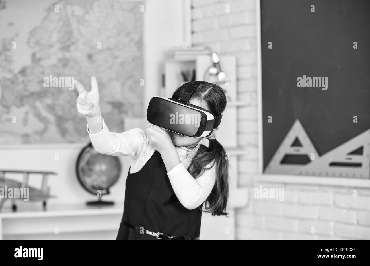 Headshot kills. Virtual classes. VR technology. schoolgirl using