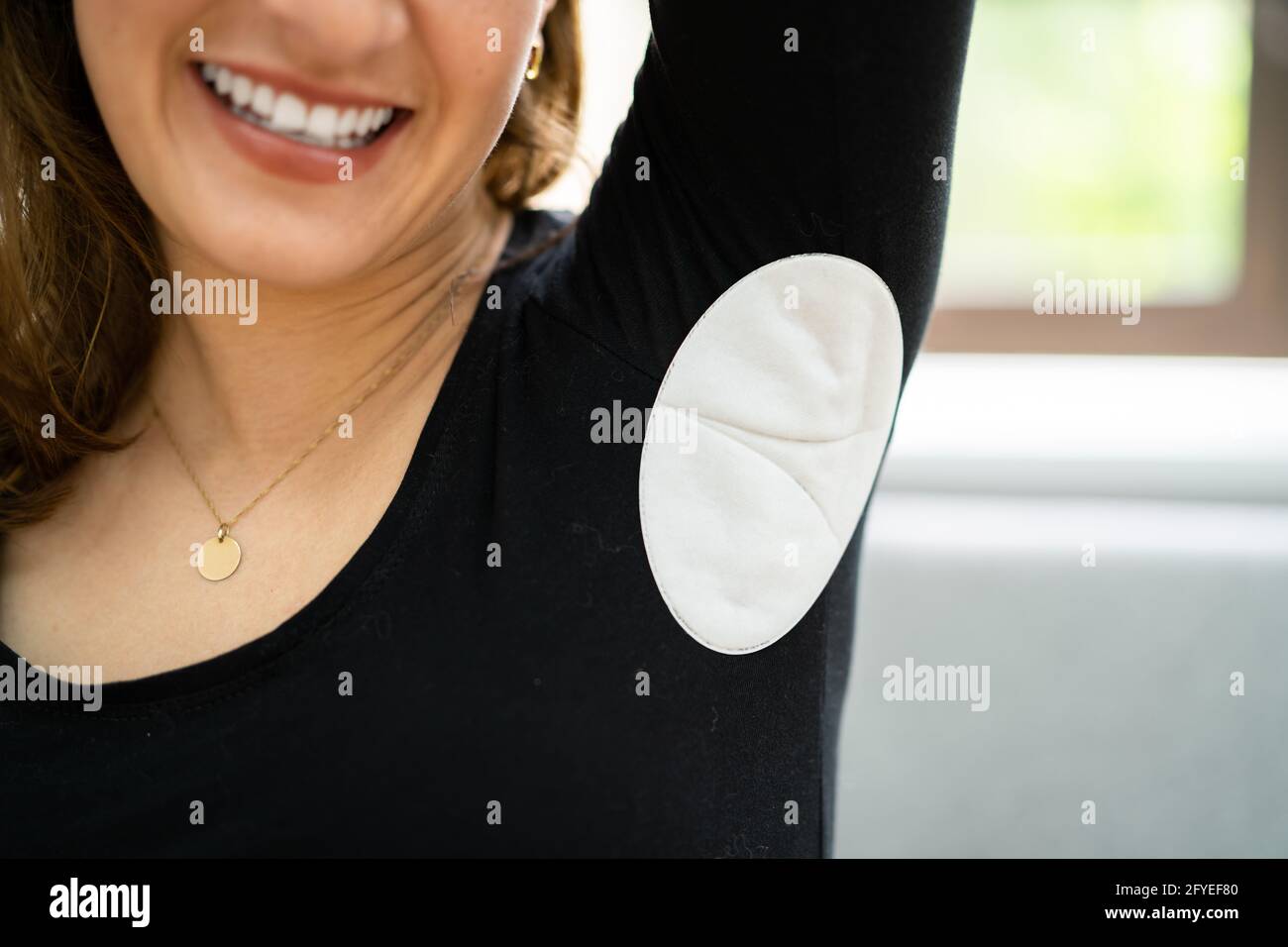 Underarm Sweat Patch Or Pad To Prevent Odor And Sweat Marks Stock Photo