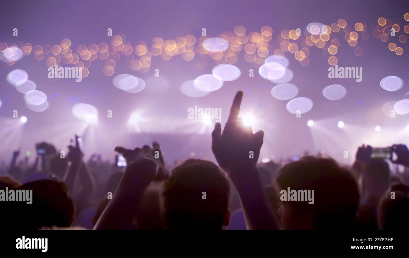 Concert Music festival and Celebrate. Party People Rock Concert. Crowd Happy and Joyful and Applauding or Clapping. Celebration party festival Stock Photo