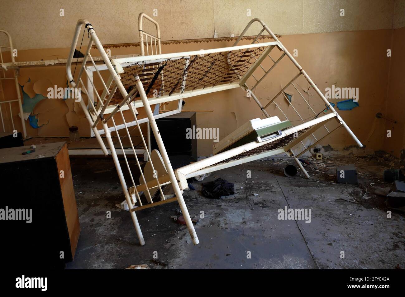 ODESA, UKRAINE - MAY 27, 2021 - An old bunk bed is left on the premises of Southern Penal Colony N51 that has been put up for sale at UAH 223 million Stock Photo