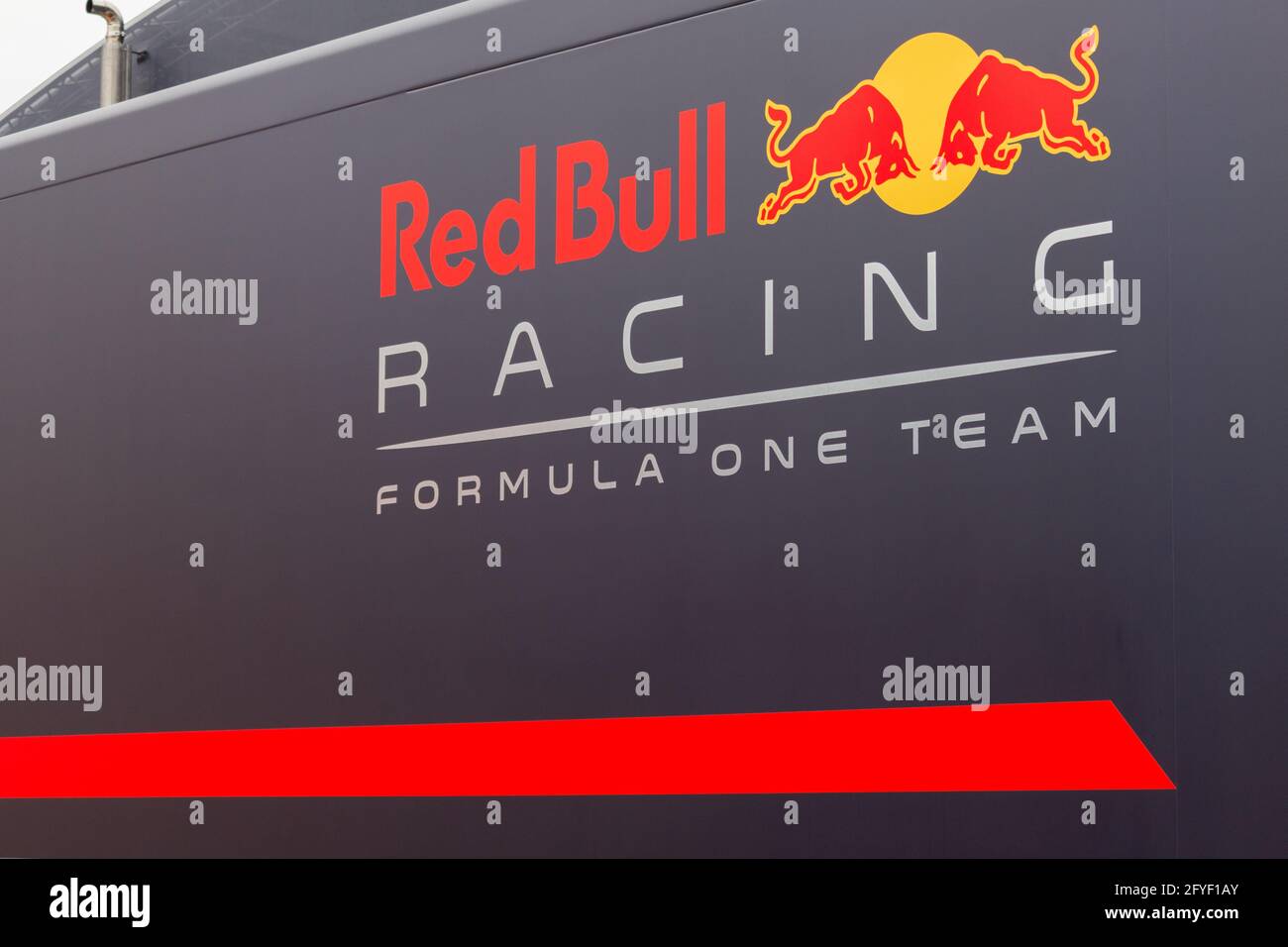 RedBull Racing logo printed on the side of a RedBull truck, taken at Silverstone race track at the British GP in  the UK. Stock Photo