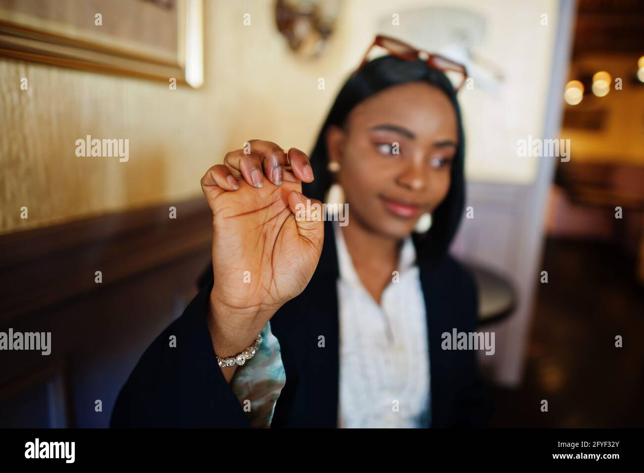 Young deaf mute african american woman using sign language Stock Photo