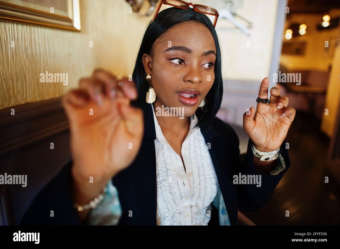 Young deaf mute african american woman using sign language Stock Photo